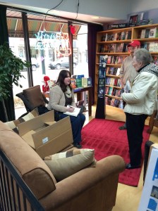 Bev Parsons (right) stops by the Book Mouse to get a copy of SARAH & KATY AND THE IMAGINATION BLANKETS signed by Julie Stroebel Barichello (left). Photo courtesy of Tim Kelleher