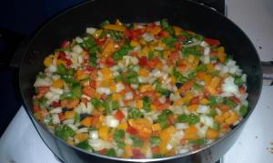 Last weekend I cooked a dish that used red, green and orange peppers, plus onions.